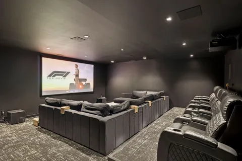 a view of a town with mountains in the background