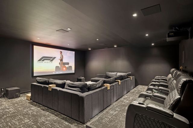 a view of a town with mountains in the background