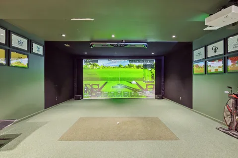 a view of a house with backyard sitting area and garden