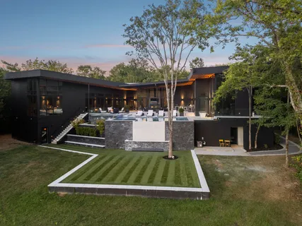 a kitchen with stainless steel appliances granite countertop a stove and a sink