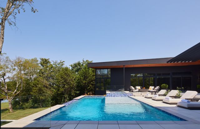 a view of an ocean with a building in the background