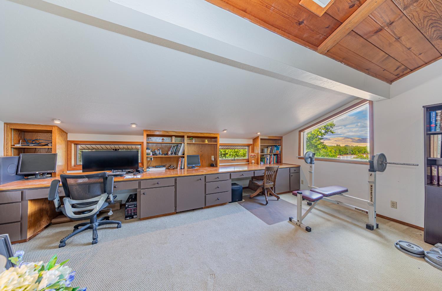 4449 Stetson Road Clovis, CA 93619 - Photo 17 of 93 a view of a workspace with furniture and a window