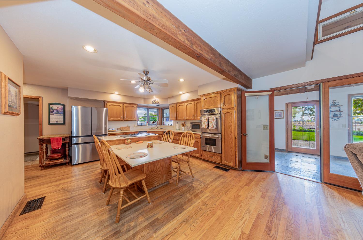 4449 Stetson Road Clovis, CA 93619 - Photo 18 of 93 a room with lots of furniture and wooden floors