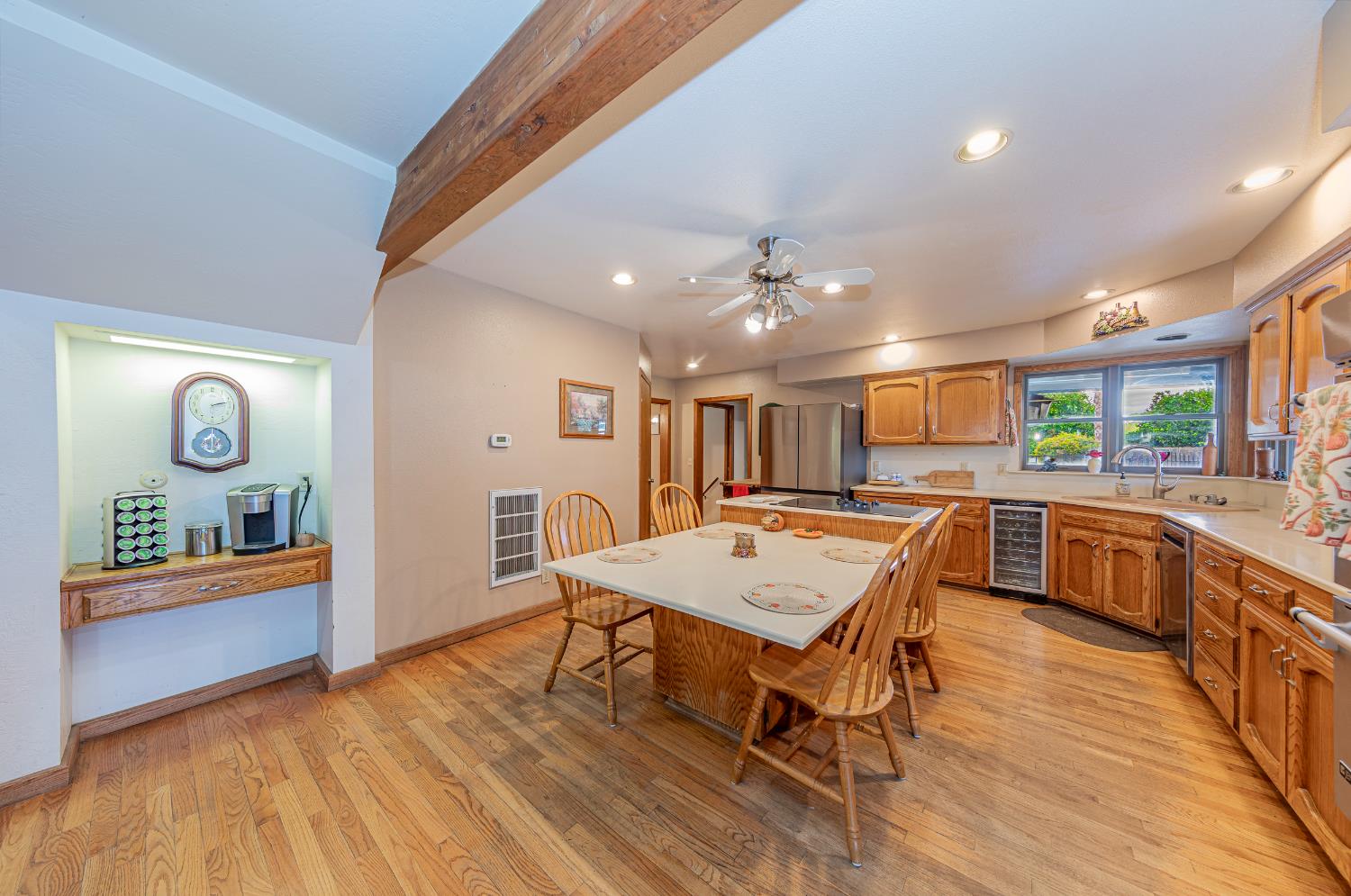 4449 Stetson Road Clovis, CA 93619 - Photo 19 of 93 a large kitchen with a table and chairs