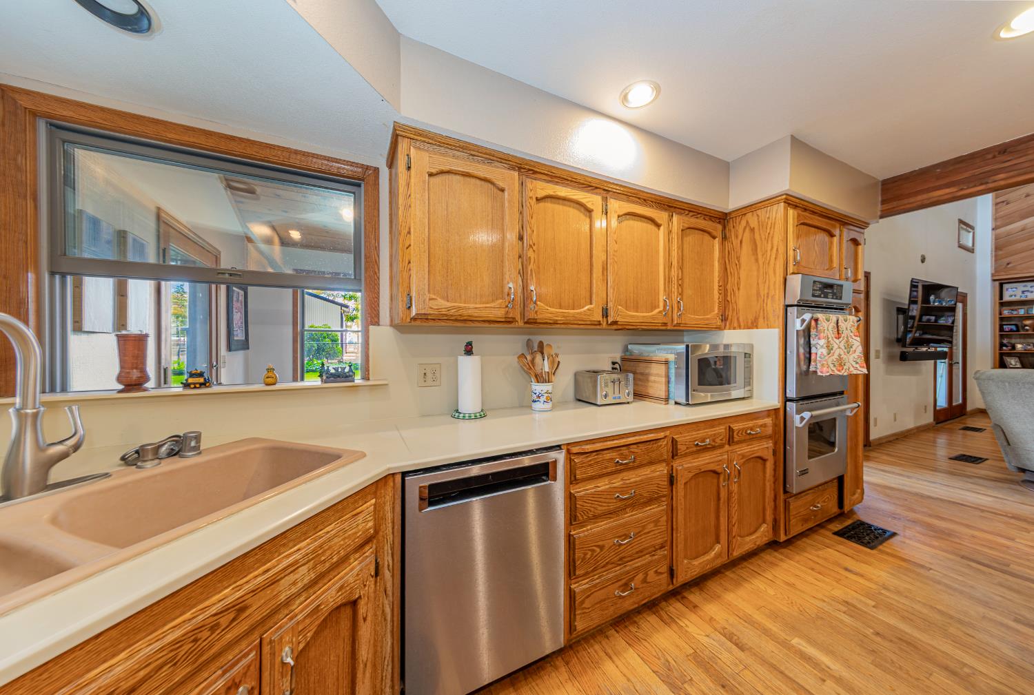 4449 Stetson Road Clovis, CA 93619 - Photo 22 of 93 a kitchen with stainless steel appliances granite countertop a sink and cabinets