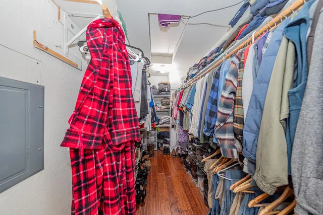 a view of street with parked cars