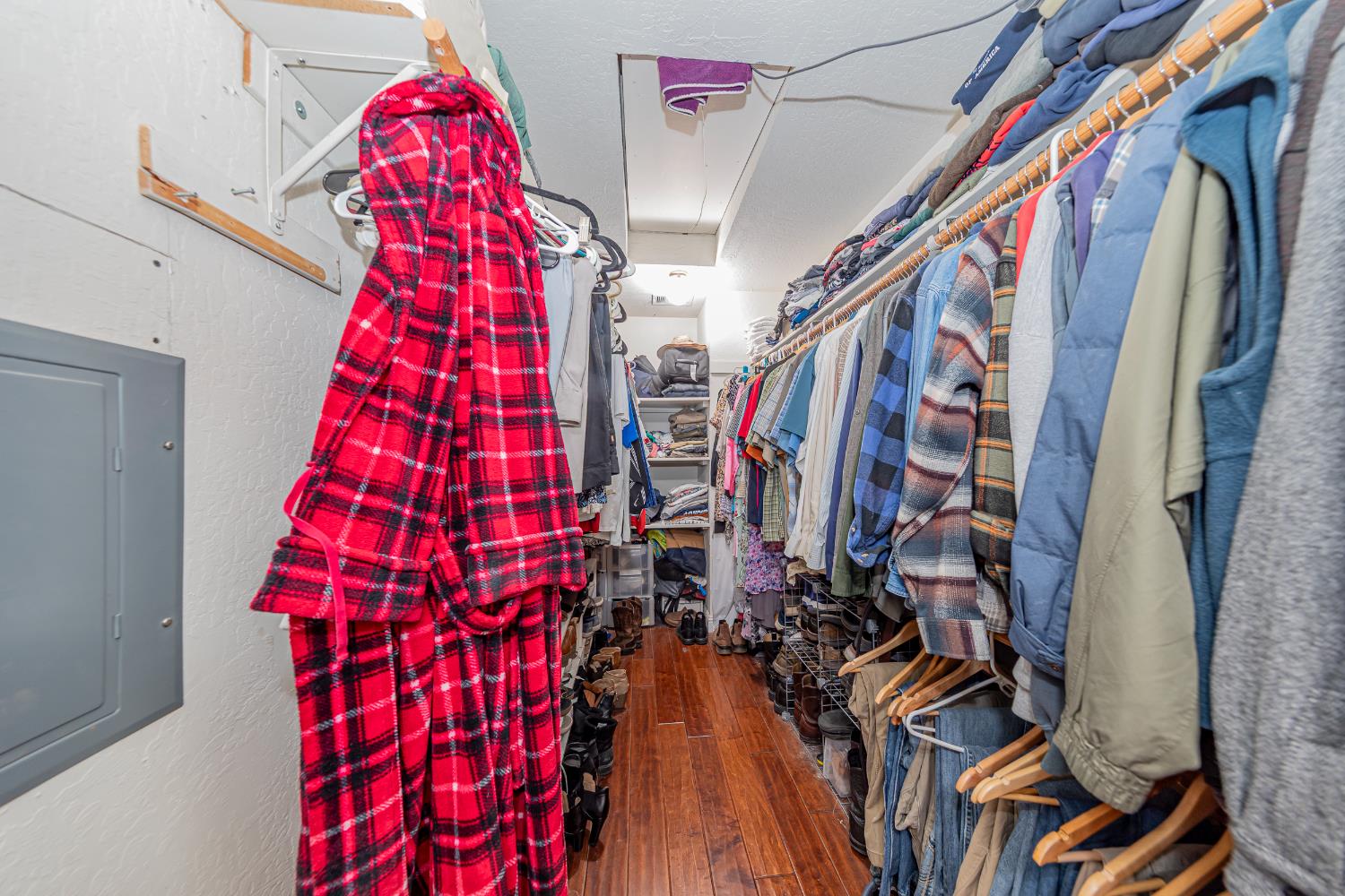 4449 Stetson Road Clovis, CA 93619 - Photo 46 of 93 a view of walk in closet with clothes and shoes