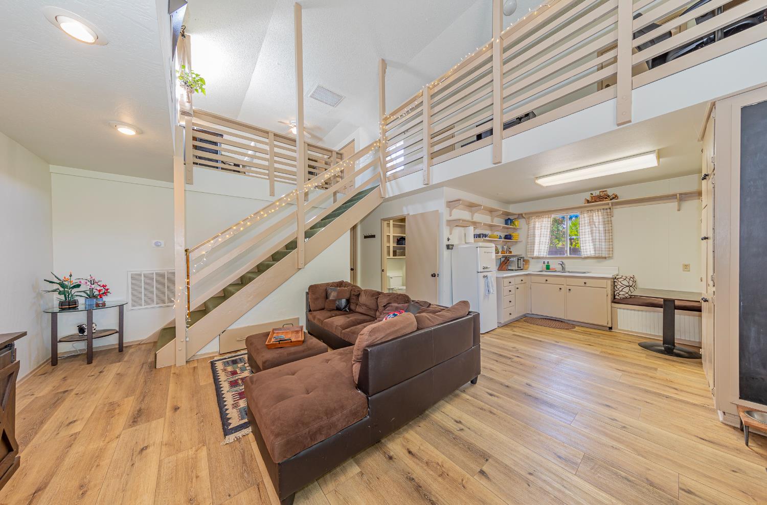 4449 Stetson Road Clovis, CA 93619 - Photo 56 of 93 a living room with furniture and a wooden floor