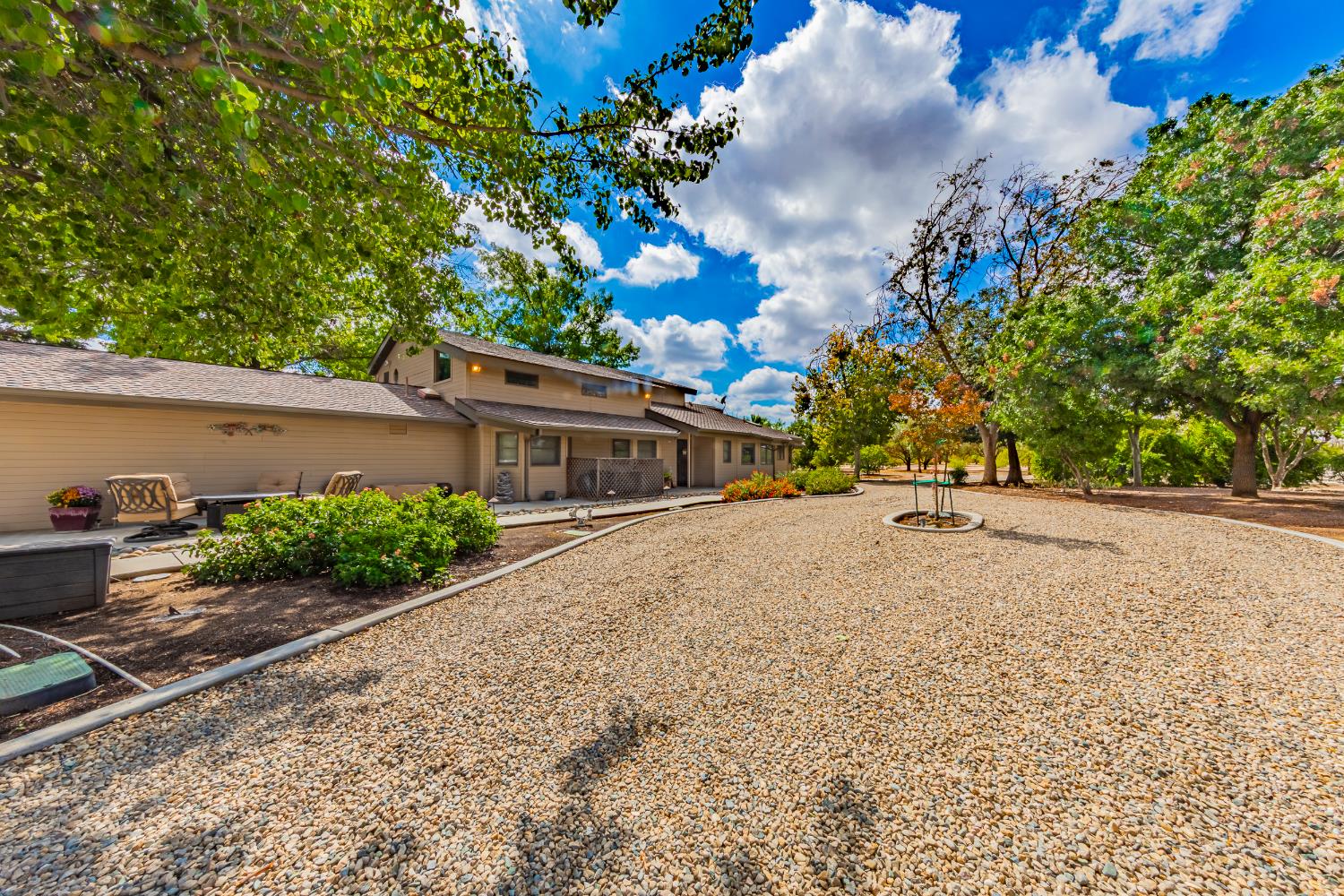 4449 Stetson Road Clovis, CA 93619 - Photo 76 of 93 a view of a house with a yard and a street