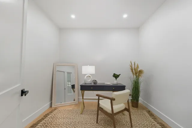 a workspace with furniture and window