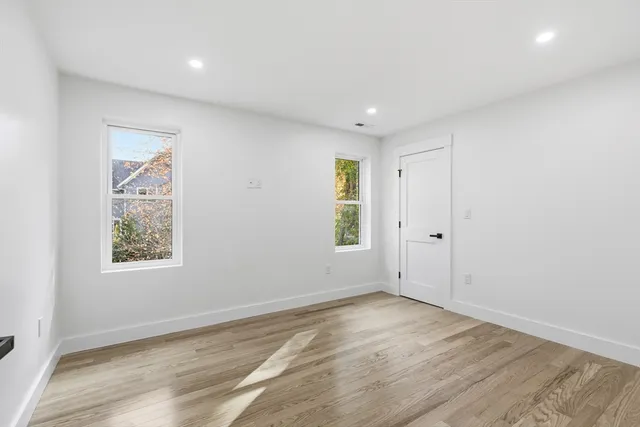 an empty room with windows