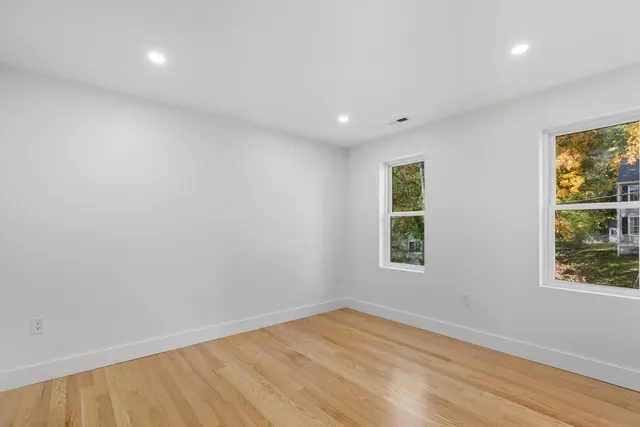 a bathroom with a toilet a sink and bathtub