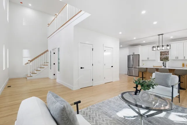 a living room with furniture and a table
