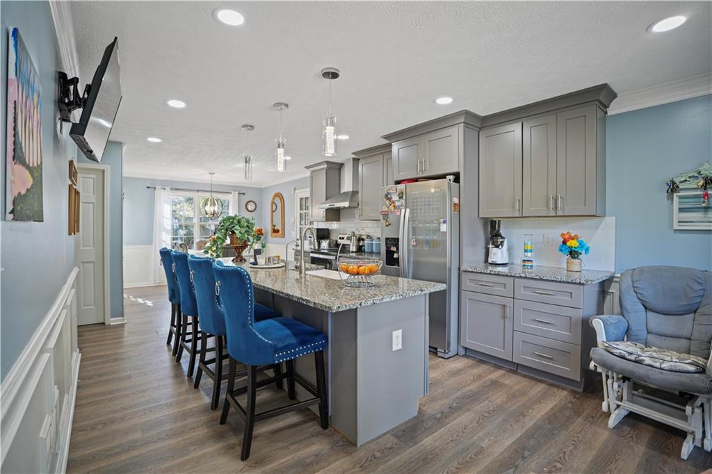 4880 Racquet Court Duluth, GA 30096 - Photo 3 of 22 a kitchen with refrigerator and cabinets