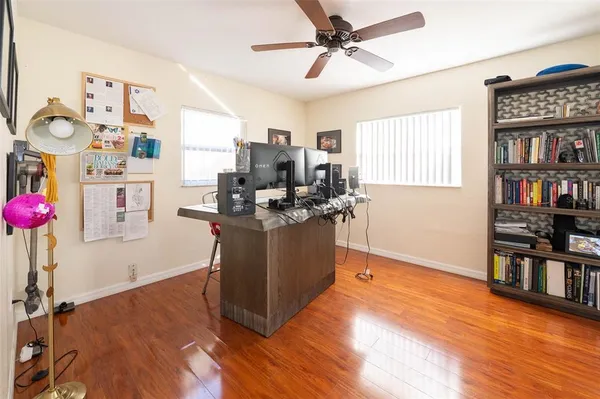 a workspace with furniture cabinet and a window