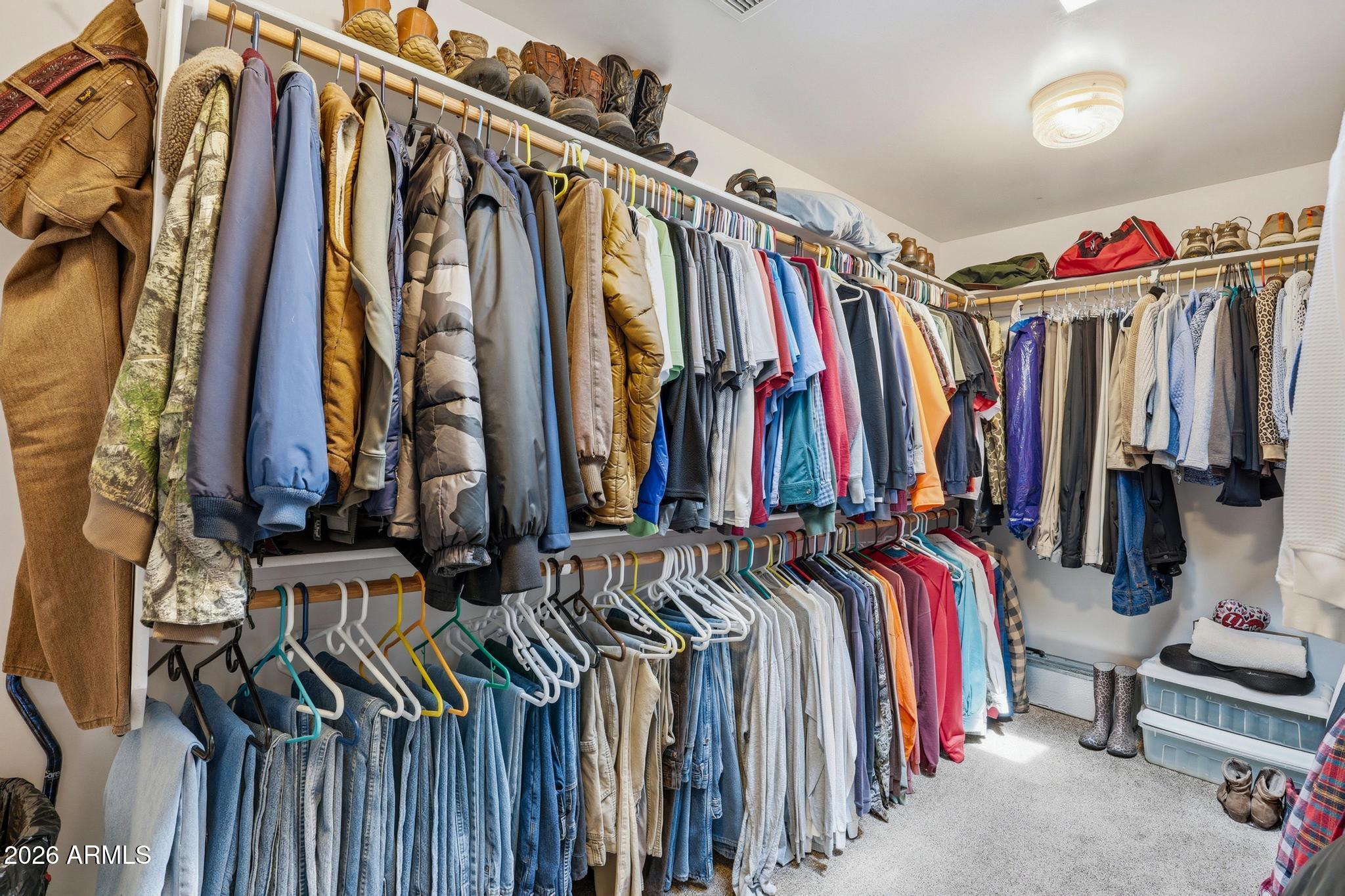 7736 West Gibson Ranch Road Payson, AZ 85541 - Photo 23 of 51 a view of walk in closet with clothes