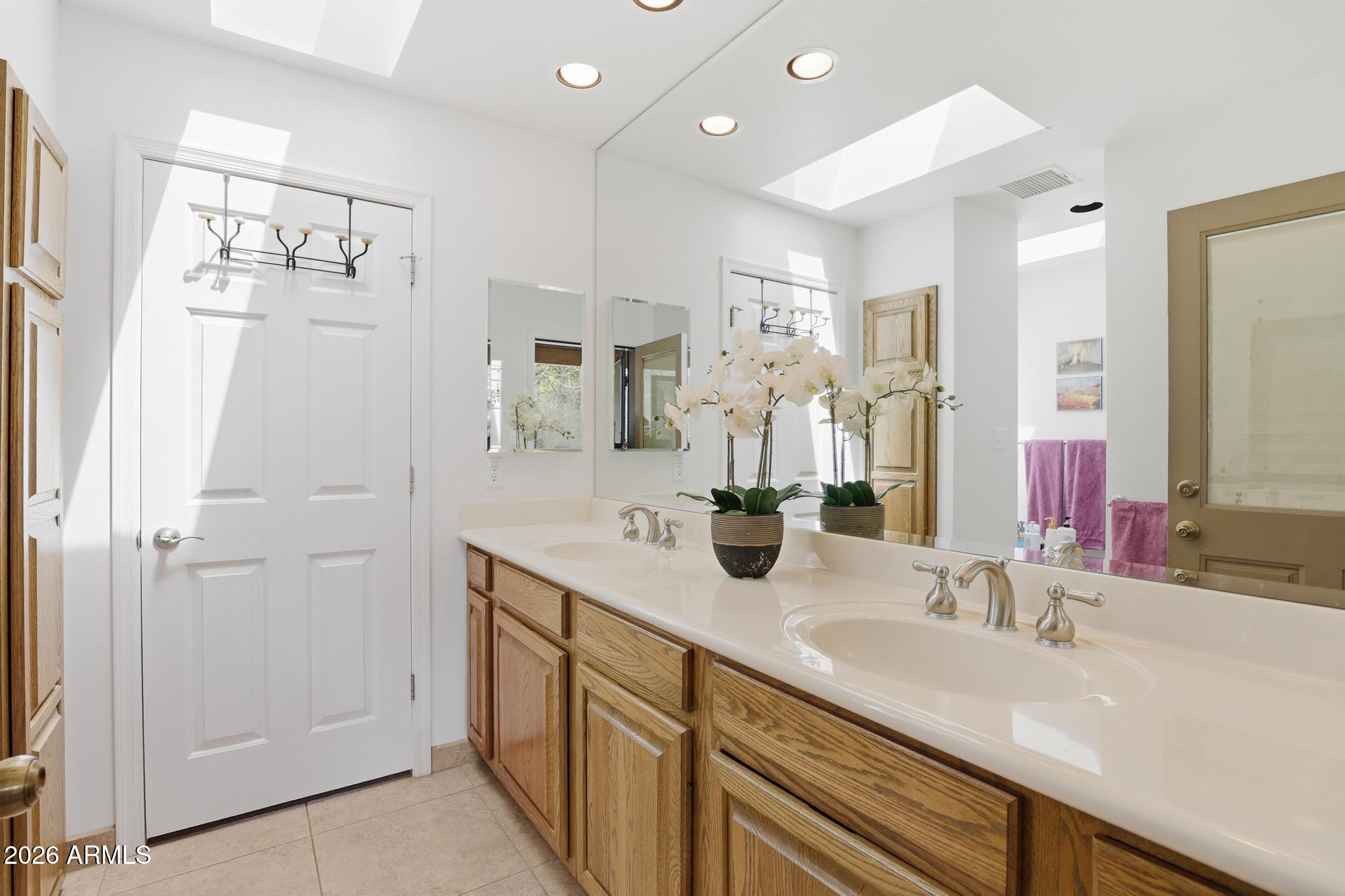 7736 West Gibson Ranch Road Payson, AZ 85541 - Photo 24 of 51 a bathroom with a double vanity sink mirror and double