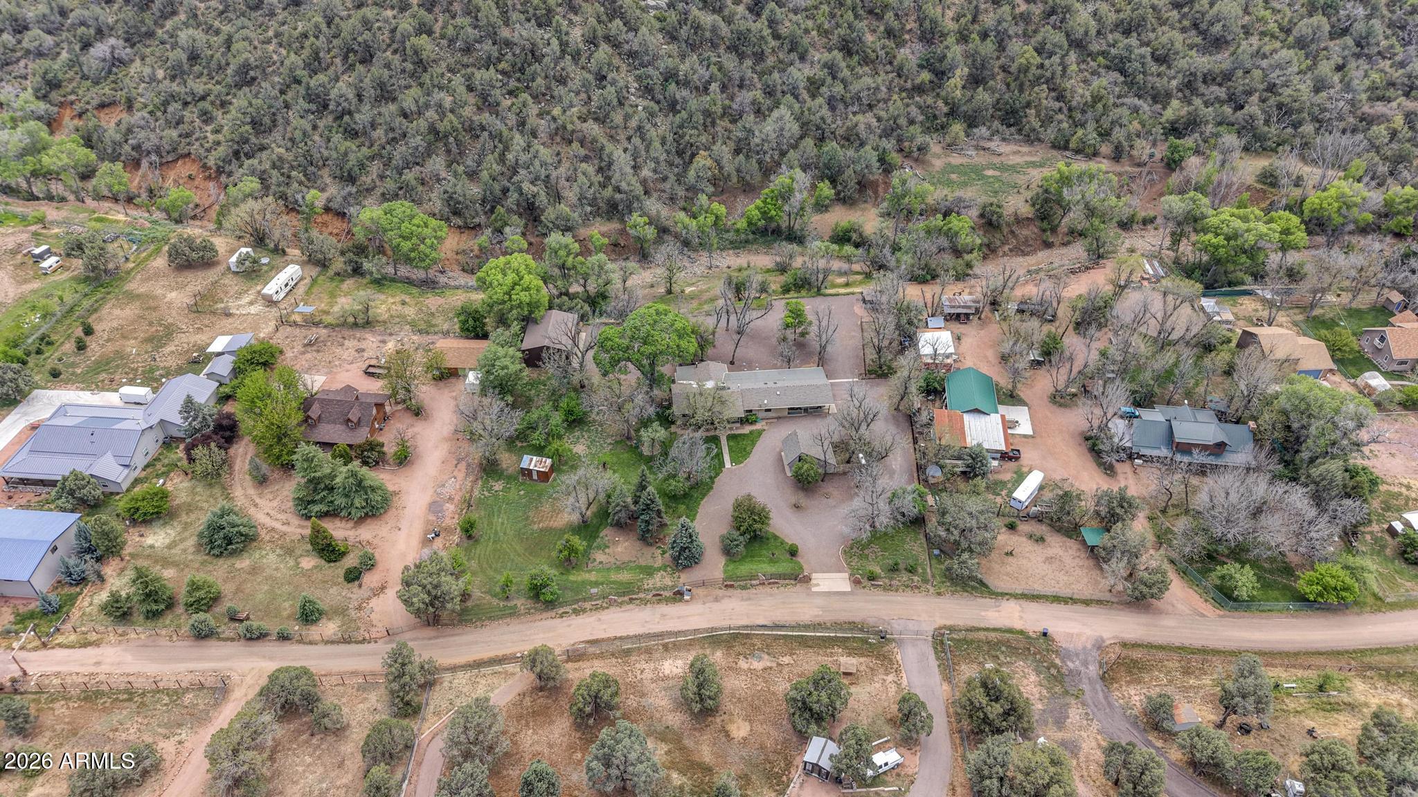 7736 West Gibson Ranch Road Payson, AZ 85541 - Photo 49 of 51 an aerial view of a house with a yard