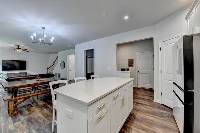 a room with gym equipment and windows