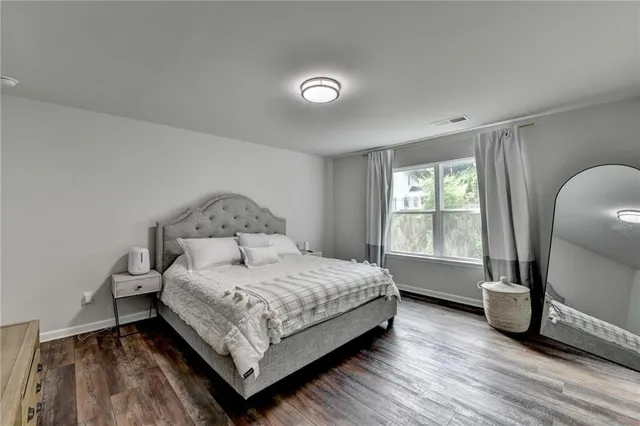 a view of a two chairs in the back yard