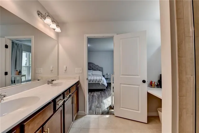 a front view of a house with a yard table and chairs