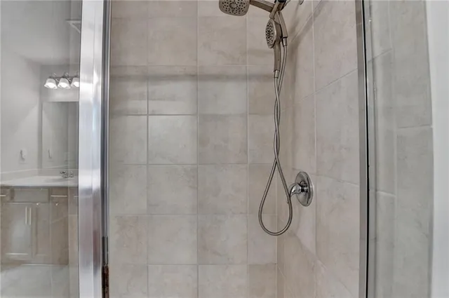 a view of a backyard with a small deck and wooden floor