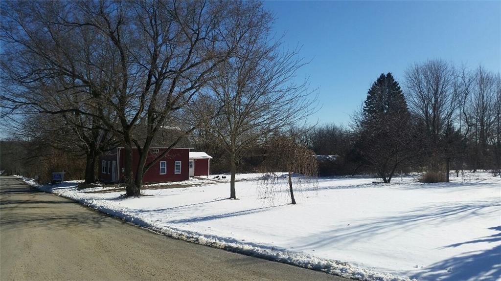 a view of a snow with snow on the road