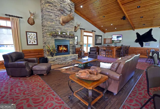 a outdoor living space with furniture and a fireplace