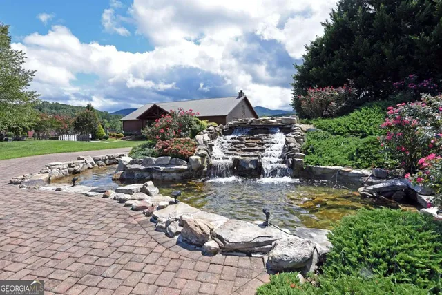 a view of a lake with outdoor space