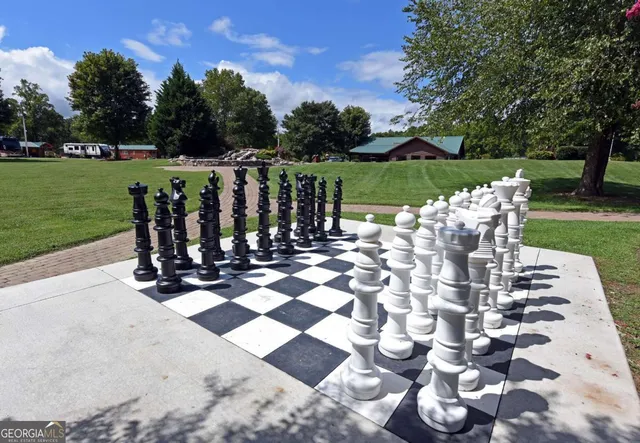 a view of a bench in front of a yard