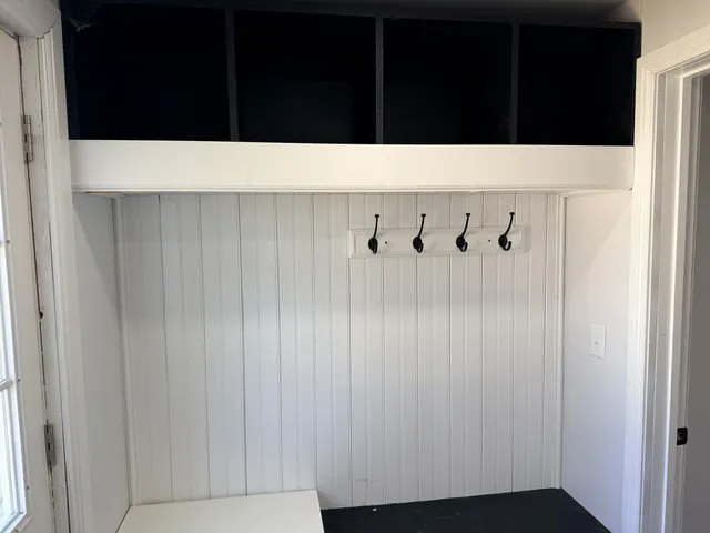 a bathroom with a tub and a shower