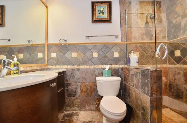 a view of a swimming pool with chairs