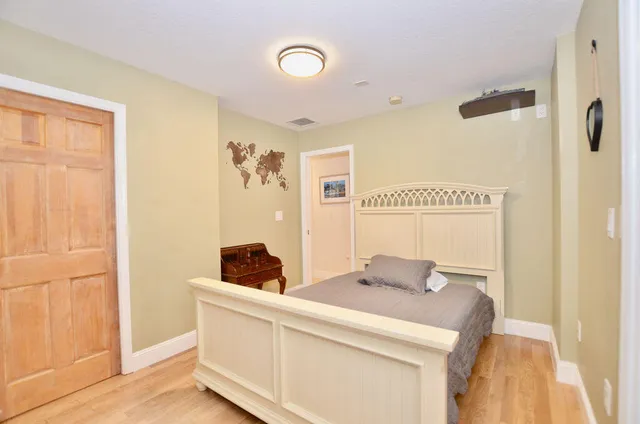 a view of a house with a table and chairs