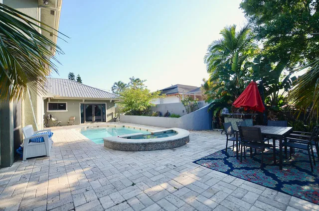 a view of a playground with basketball court