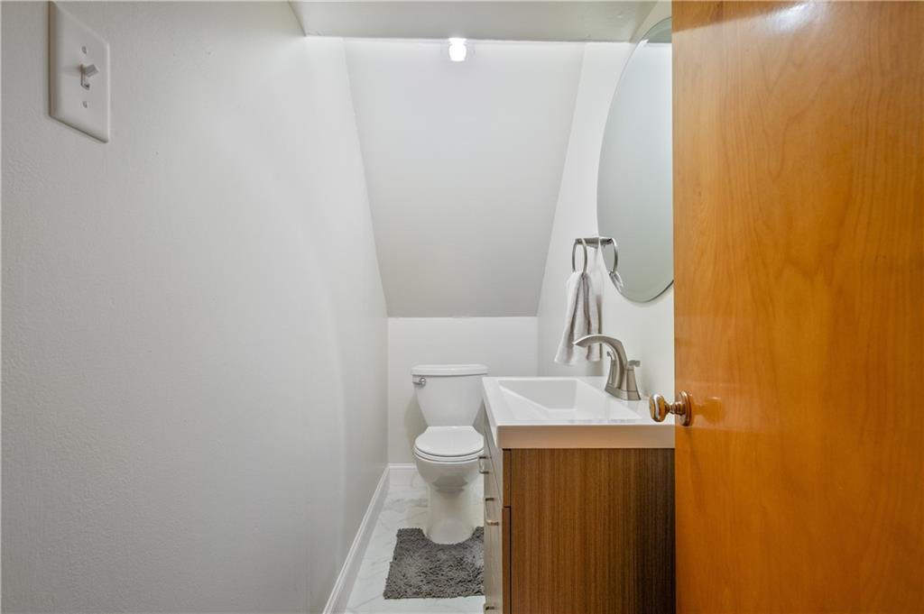 30 Beaver Grade Road McKees Rocks, PA 15136 - Photo 20 of 26 a bathroom with a toilet and a sink