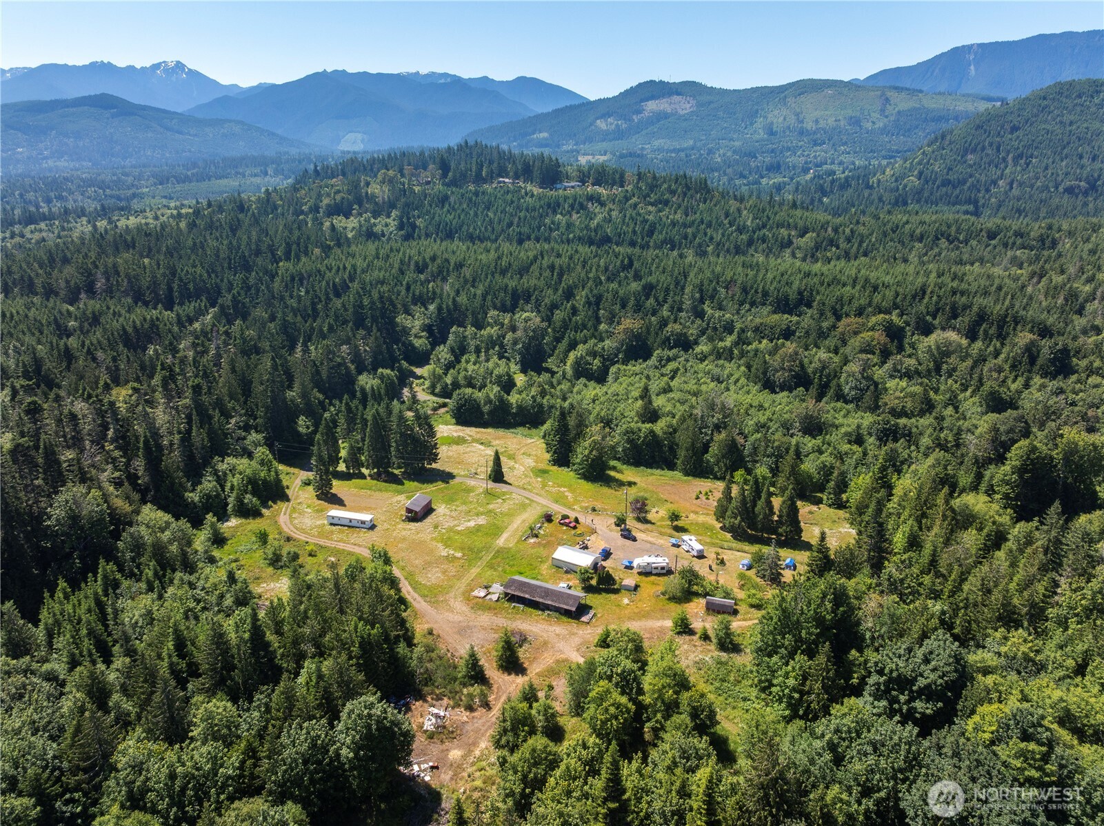1048 Peters Road Port Angeles, WA 98363 - Photo 4 of 25 a view of a house with a mountain view
