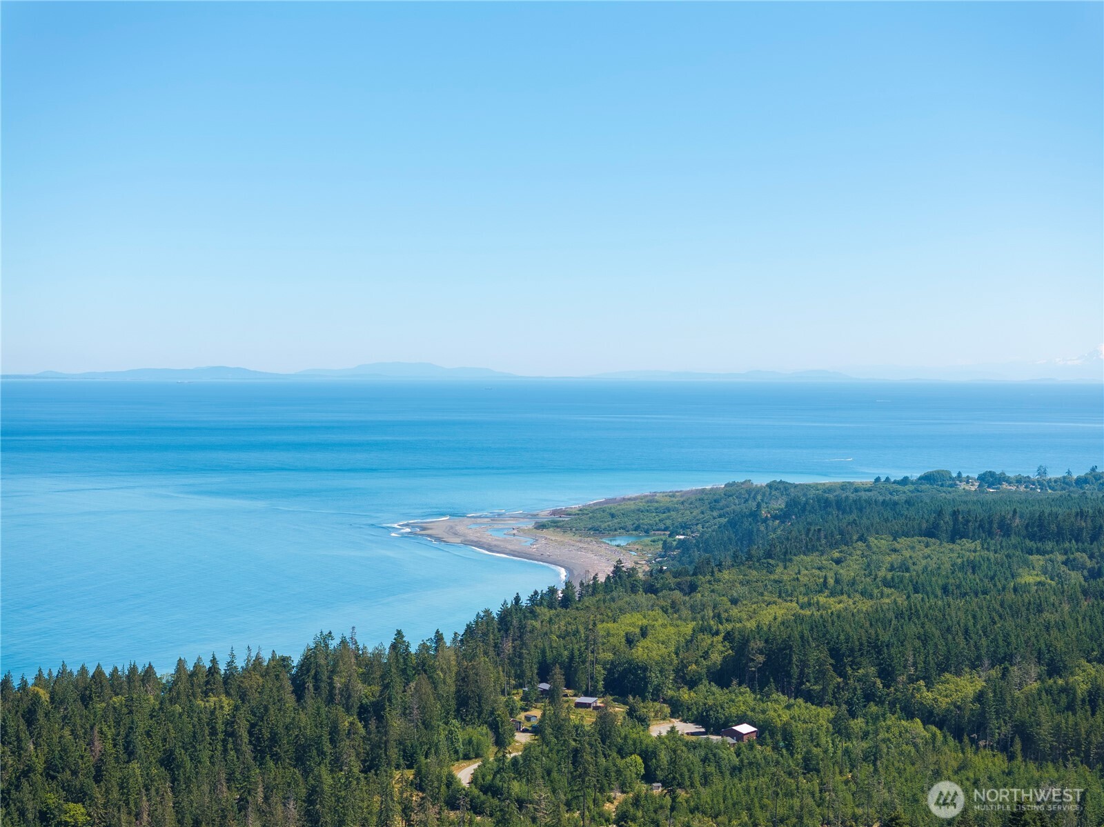 1048 Peters Road Port Angeles, WA 98363 - Photo 8 of 25 a view of a lake and mountain