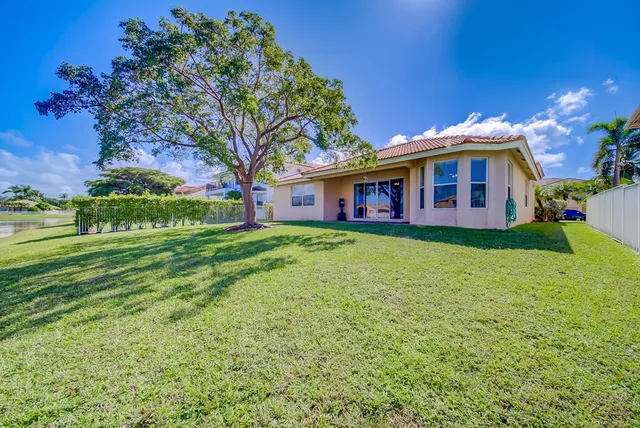 a view of a house with a big yard