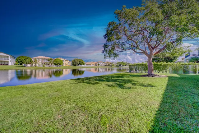 a view of outdoor space with garden and trees