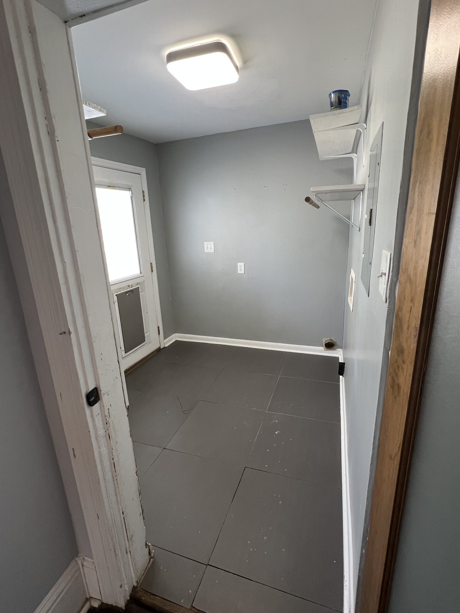 201 Pleasant Street Mount Pleasant, TN 38474 - Photo 25 of 38 wooden floor in an empty room with a window