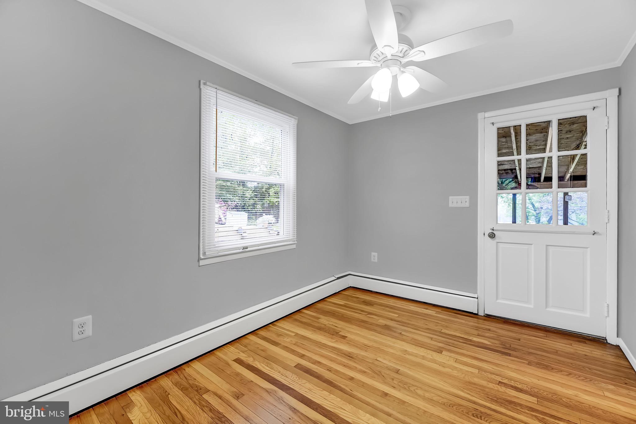 900 Olmstead Road Baltimore, MD 21208 - Photo 17 of 46 Dining area open to porch