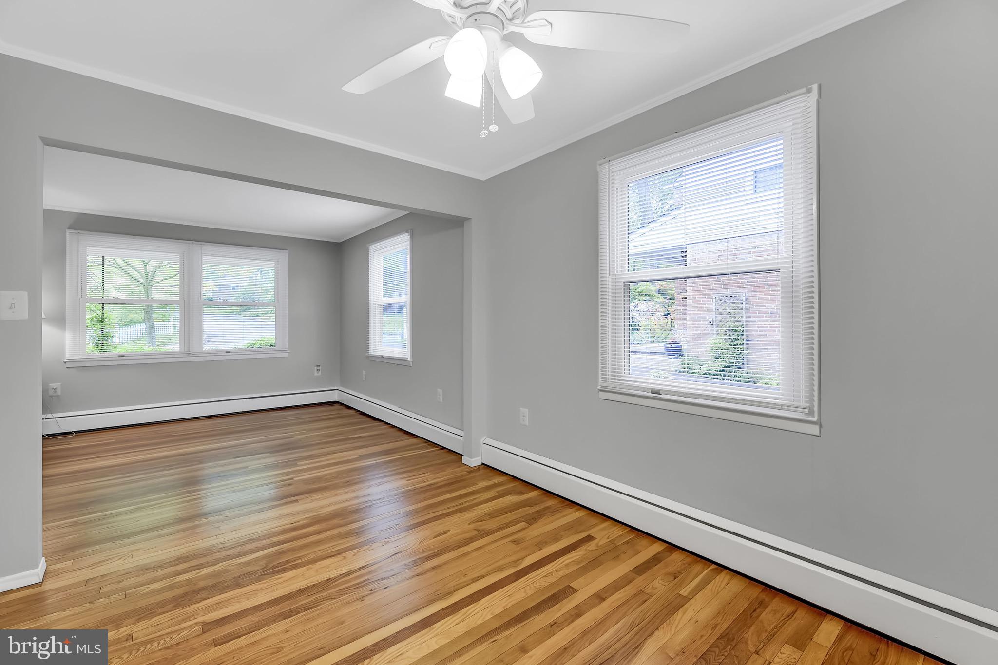 900 Olmstead Road Baltimore, MD 21208 - Photo 28 of 46 Living room open to dining room