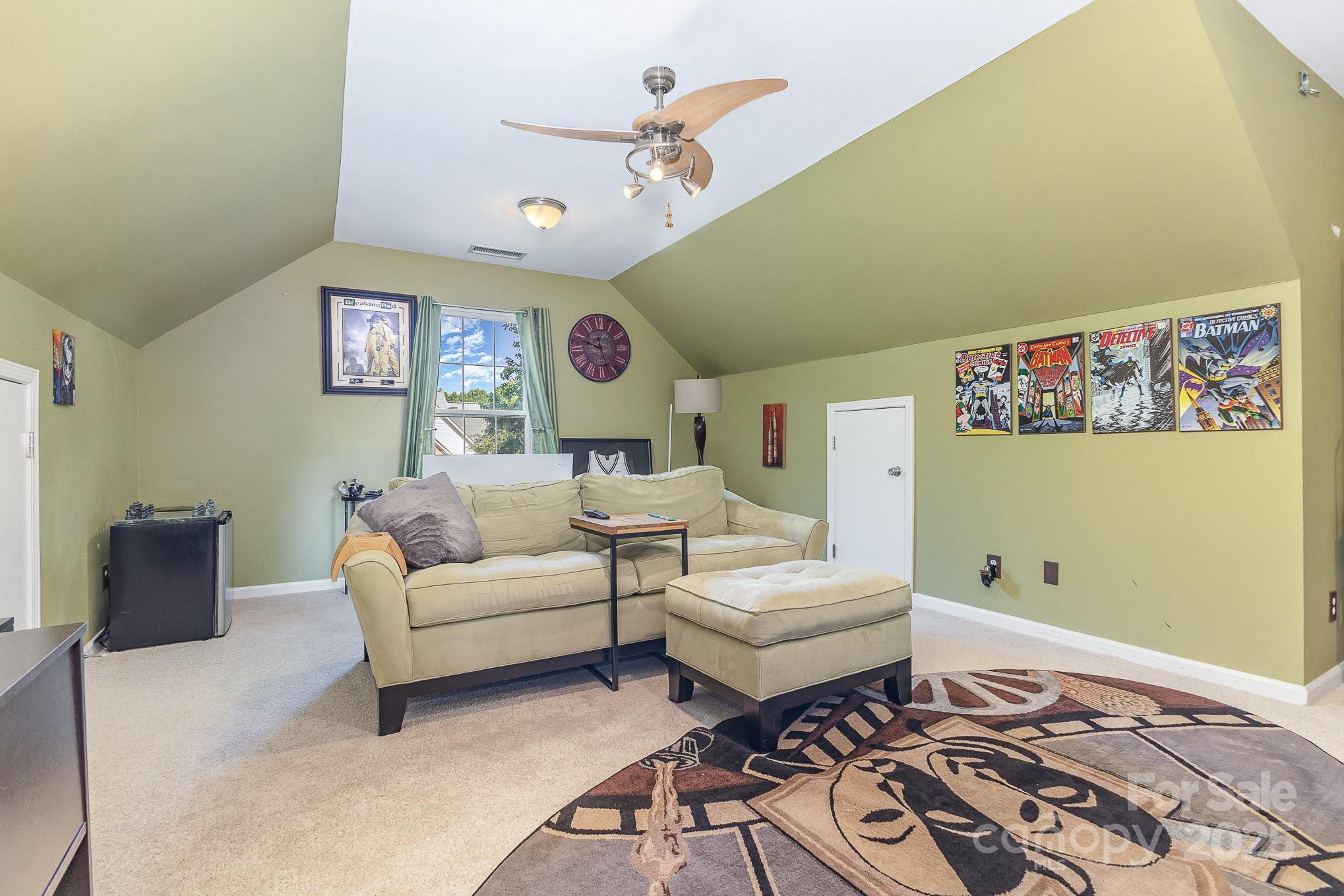 815 Clearbrook Road Matthews, NC 28105 - Photo 27 of 45 a living room with furniture and a table