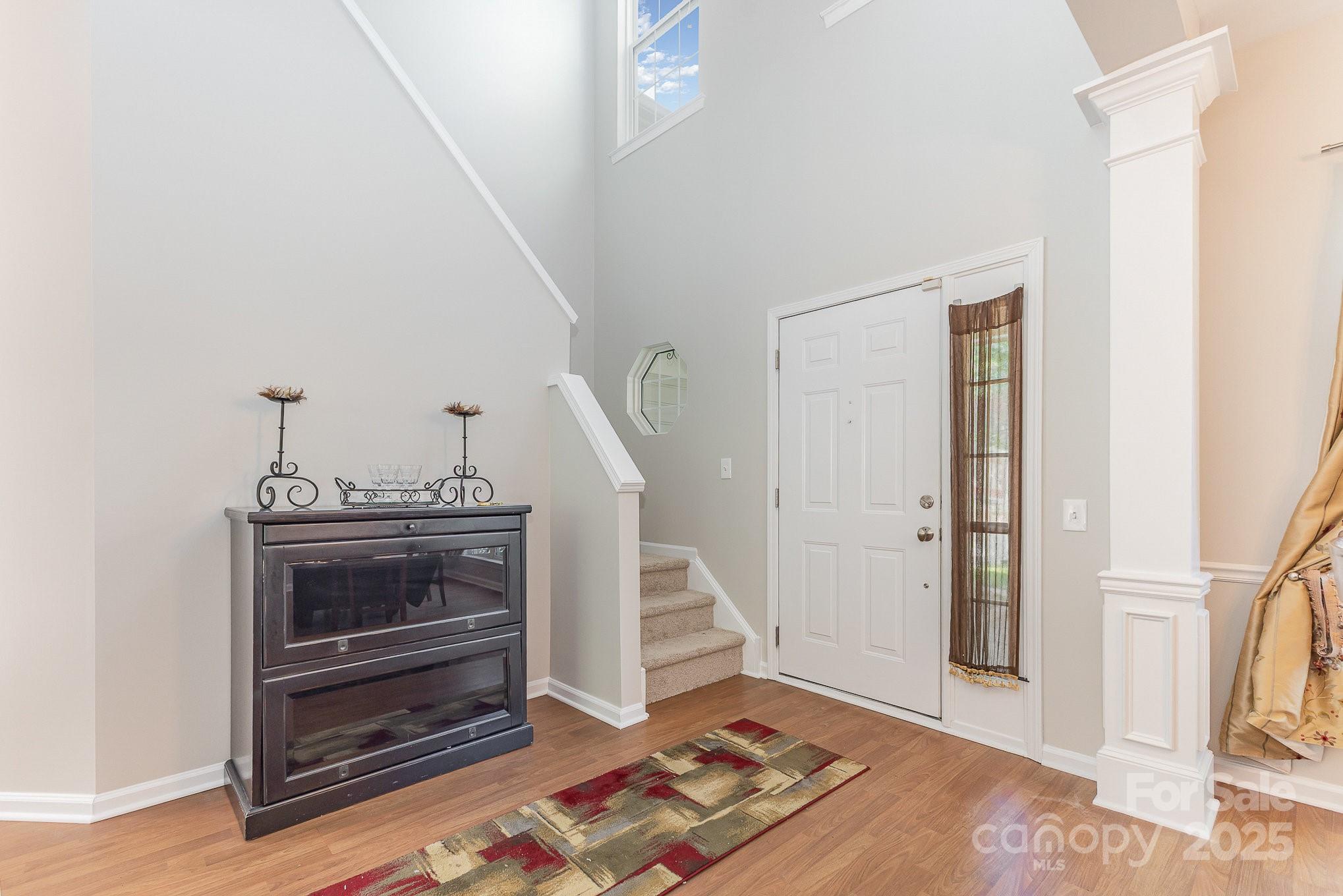 815 Clearbrook Road Matthews, NC 28105 - Photo 3 of 45 a view of an entryway with stairs