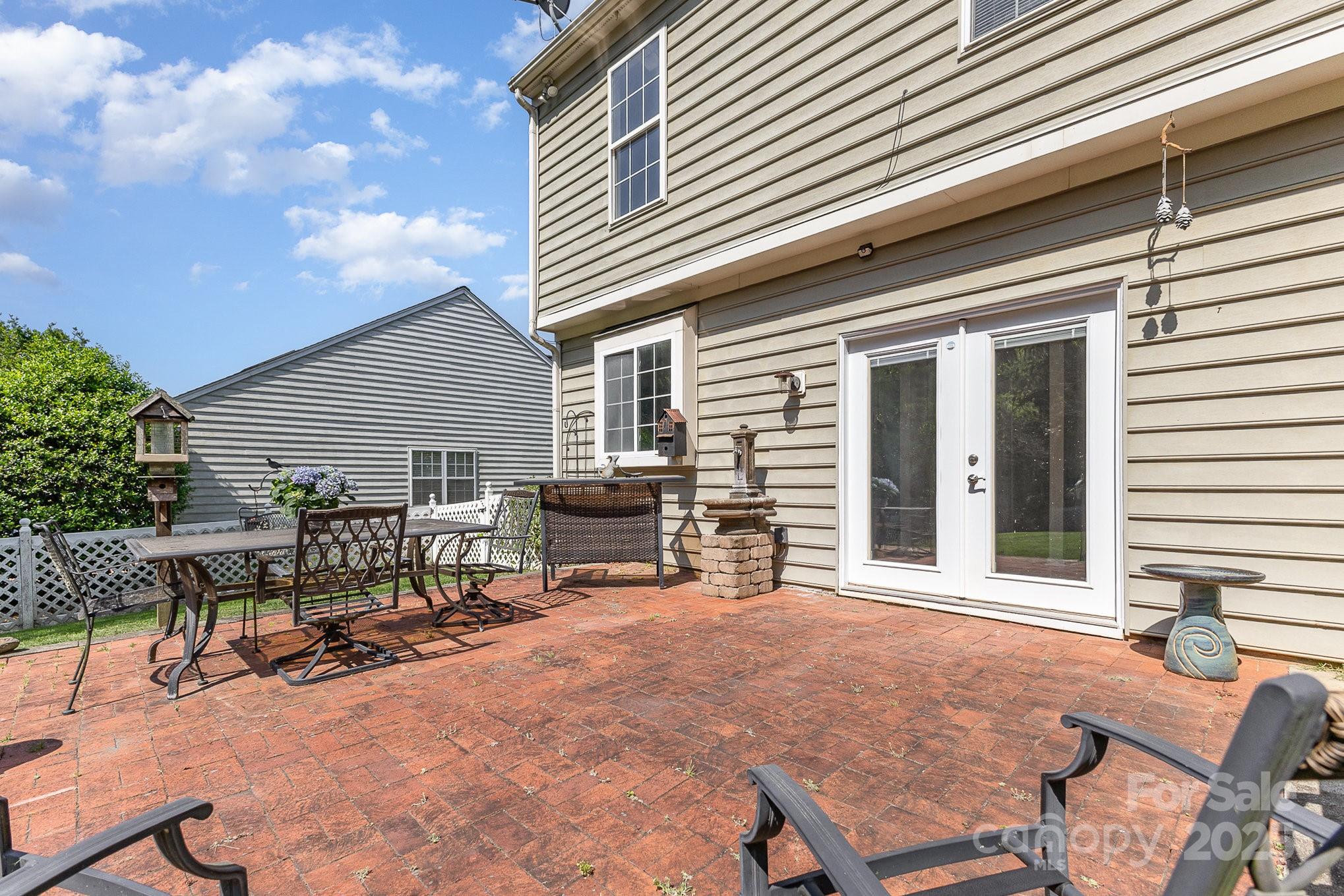 815 Clearbrook Road Matthews, NC 28105 - Photo 31 of 45 a view of house with outdoor seating