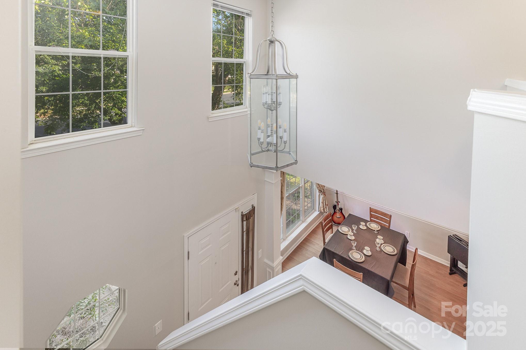 815 Clearbrook Road Matthews, NC 28105 - Photo 6 of 45 a view of an entryway with wooden floor