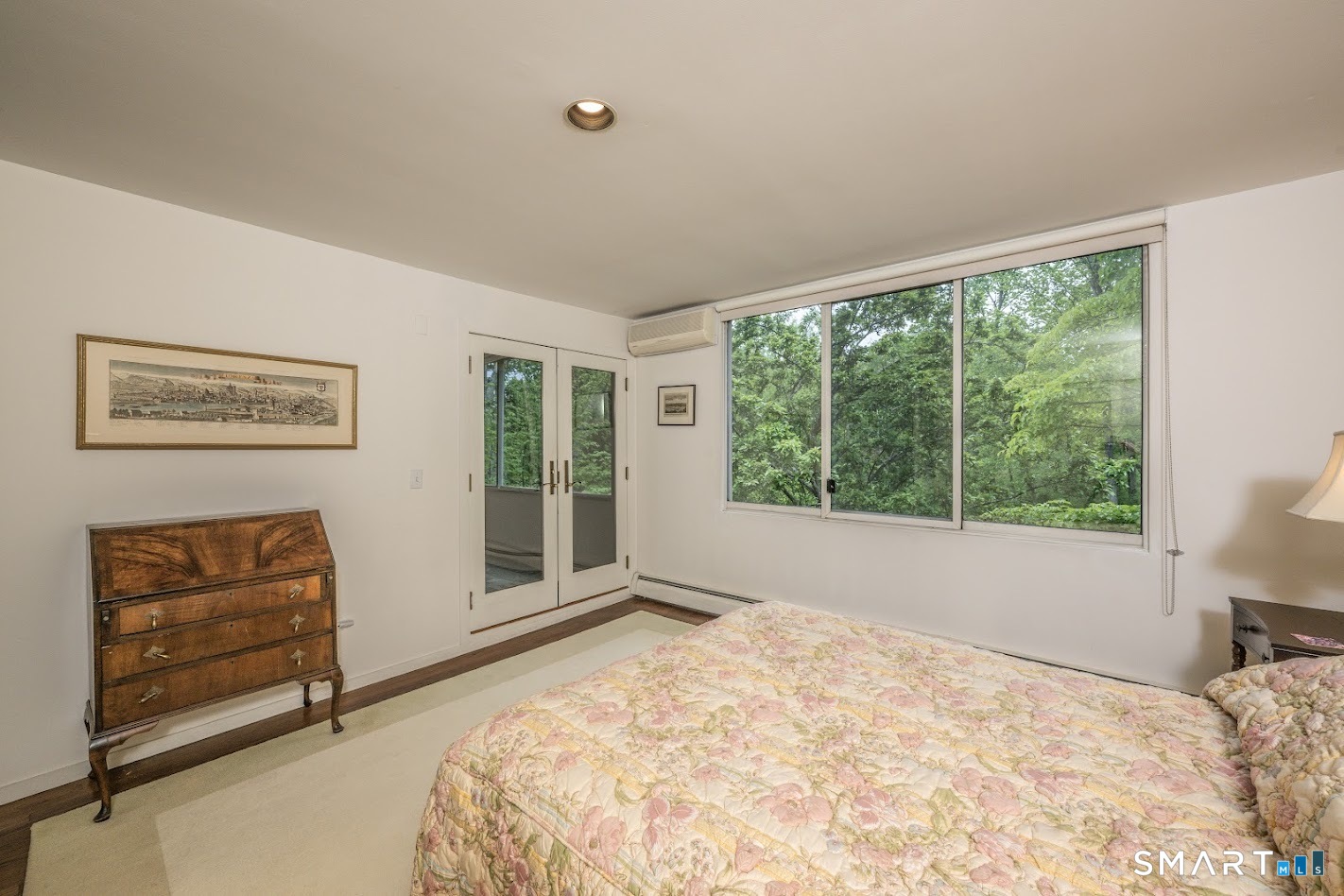 370 R Maiden Lane Durham, CT 06422 - Photo 17 of 28 A bedroom designed for quiet mornings and peaceful evenings, with a private covered balcony just beyond the doors.