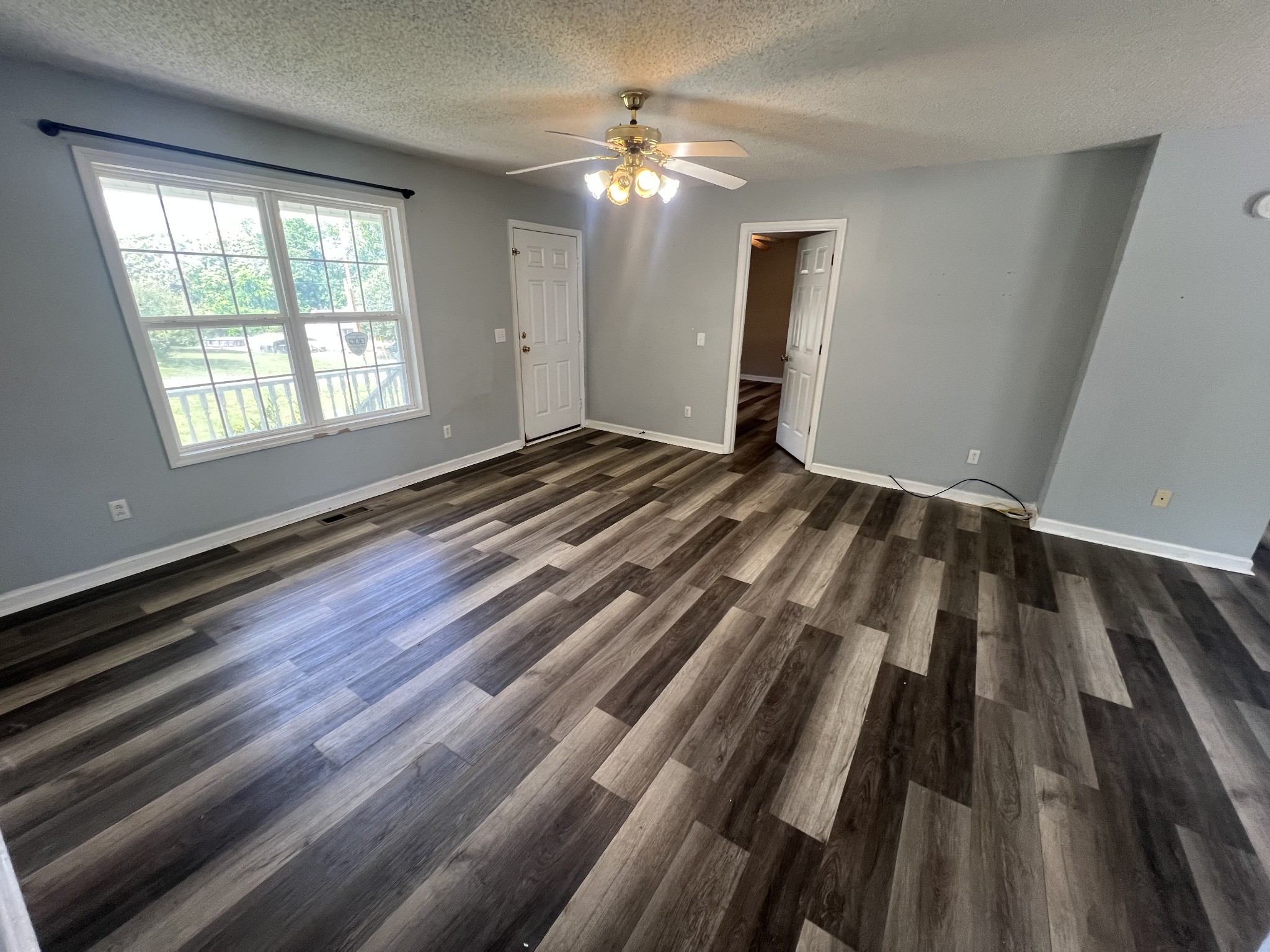 149 Hawthorne Street Pulaski, TN 38478 - Photo 5 of 33 a view of an empty room and window