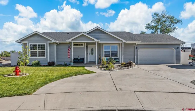 a porch with seating space and a garden
