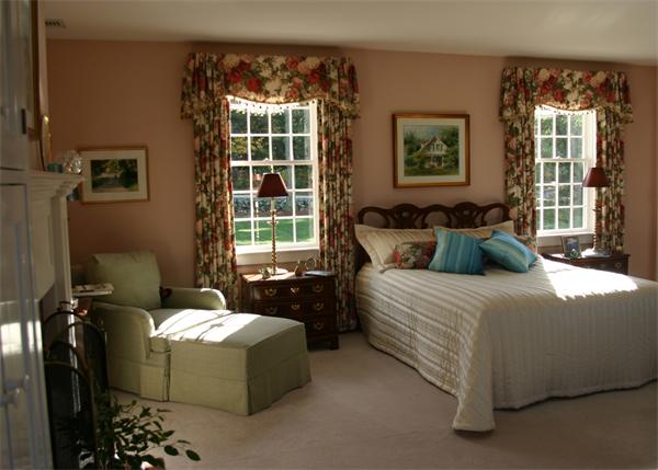188 Prospect Hill Road Harvard, MA 01451 - Photo 20 of 30 a bedroom with a bed and wooden floor
